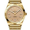 Breitling Breitling Chronomat Automatic 36 Victoria Beckham K103801A1A1K1  K103801A1A1K1 механические женские часы бежевый циферблат, браслет 18-каратное желтое золото — вид спереди